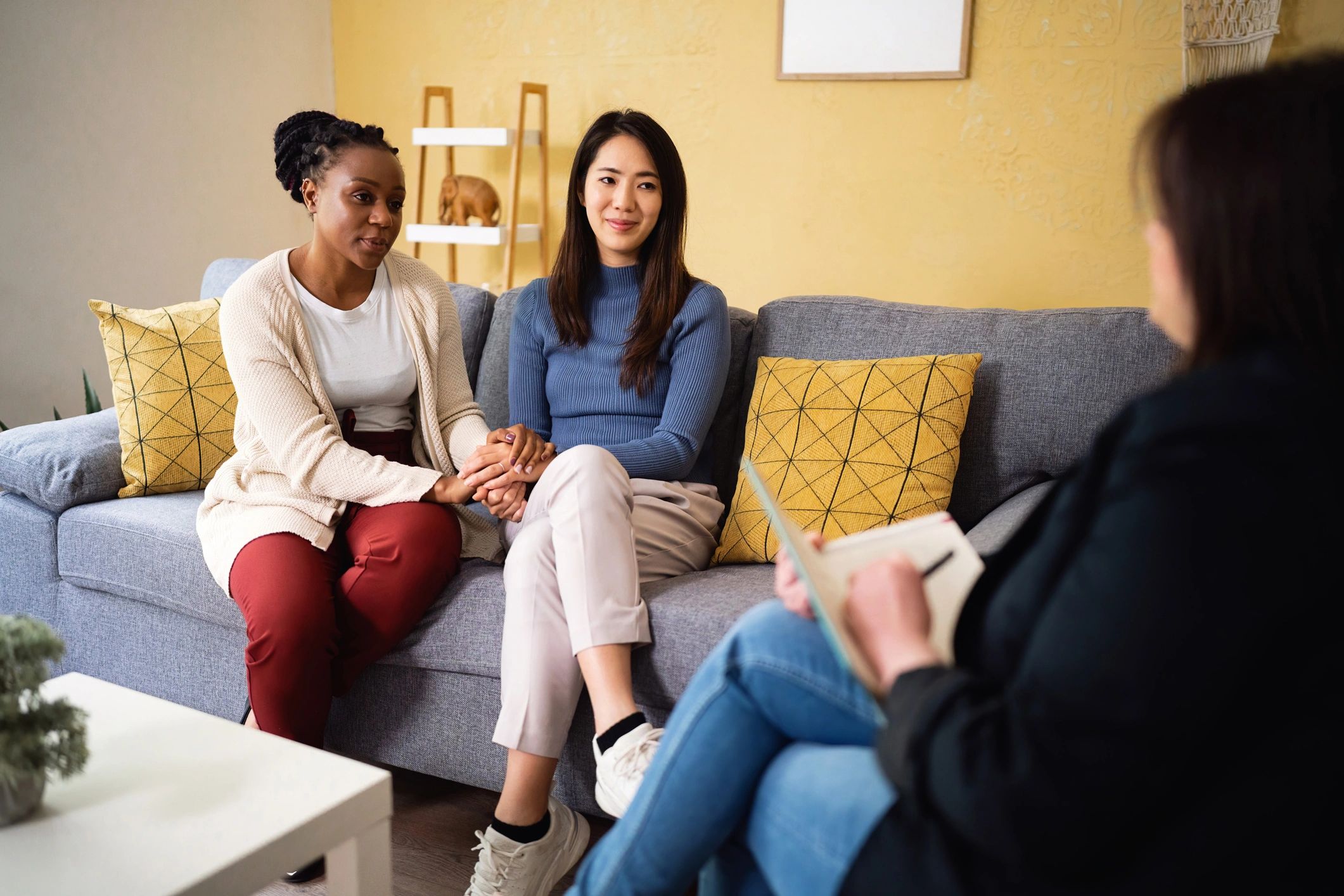 Male and female couple in a supportive therapy session