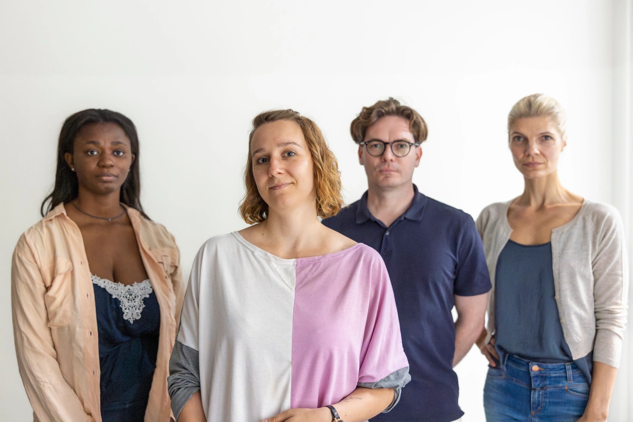 Diverse people standing together in mental health support group